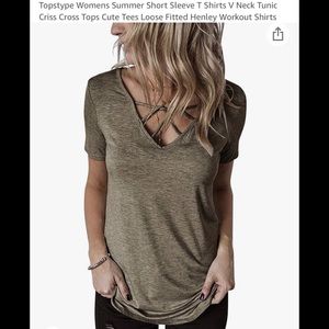 Size large women’s t-shirt with cute twist/tie pattern in the collar area.